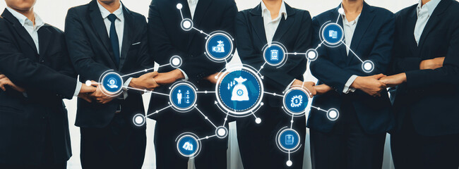Business professionals collaborating with technology icons representing reduction, efficiency, and...