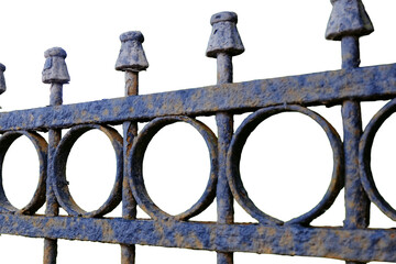 A close-up view of a metal fence with decorative circles