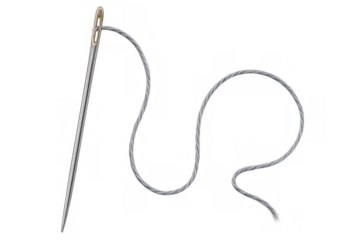 Sharp sewing needle threading white string, resting against clean transparent surface, highlighting precision of textile crafting technique