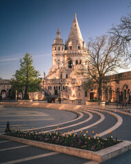 Sunrise at Fisherman’s Bastion in Budapest, Hungary – Spring Travel Destination with Tulips in...