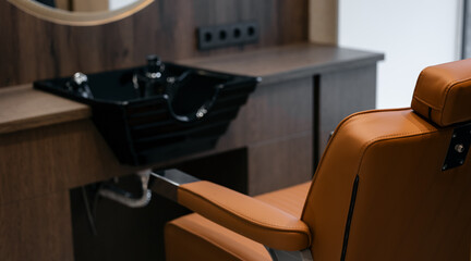 Modern barber shop interior with stylish chair and sink, retro tonning