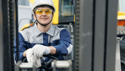 Portrait Industrial driver of forklift, Caucasian male adult in mining gear operating machinery...