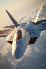 High-angle view of a fighter jet soaring through the clouds.