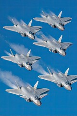 Several fighter jets in a formation flight against a clear sky.