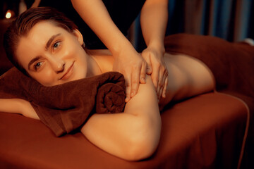 Caucasian woman customer enjoying relaxing anti-stress spa massage and pampering with beauty skin...