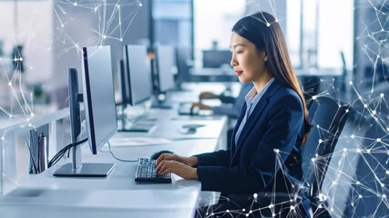 Businesswoman working at computer - Powered by Adobe