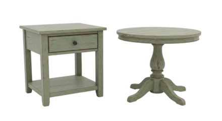 Charming end table and a petite round table display aged pastel green finish against a stark black backdrop, a testament to simple elegance, transparent background