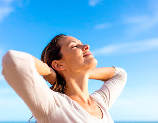 adult woman in sunlight on blue sky