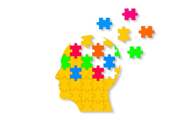 Dementia and parkinson's disease. Head and brain diseases concept. Human head shaped puzzle on white background.