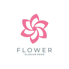 Minimal pink flower logo design with petals for beauty or floral branding