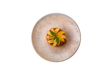 Sweet round pie or tart with apples and peach. Mini sweet tart