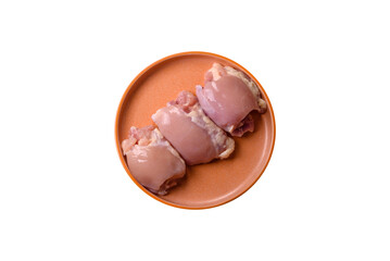 Raw chicken thigh fillet without skin and bone with salt and spices. Raw chicken fillet for cooking