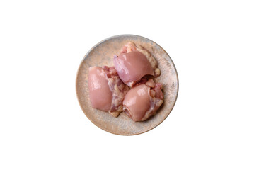 Raw chicken thigh fillet without skin and bone with salt and spices. Raw chicken fillet for cooking
