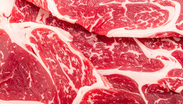 Beef marble texture. Fresh raw meat backdrop. Top view.