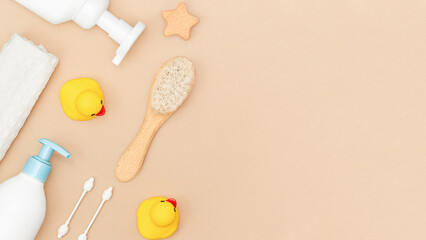 beige background of baby care items with copy space
