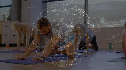 Yoga coach shifting knee, guiding seniors to hip stretch for flexibility with digital globe overlay - Powered by Adobe