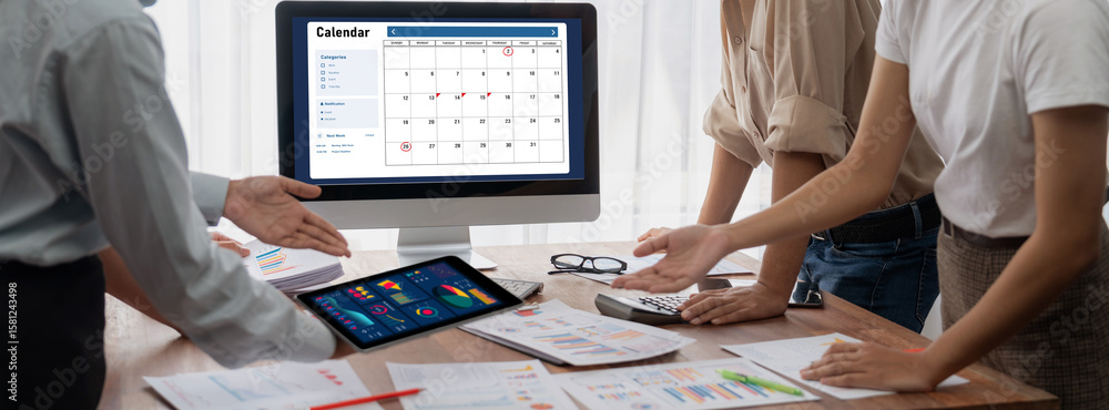 Poster calendar on computer software application for brisk schedule planning for personal organizer and onl