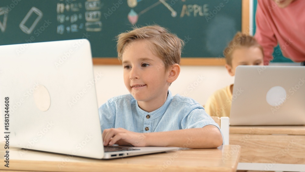 Poster caucasian boy working at laptop while diverse children programing software system. teacher and stude