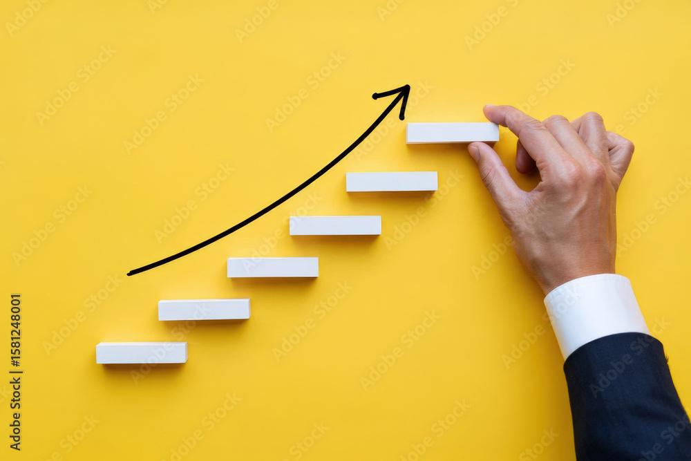 Poster strategic growth and development concept hand placing a block on a staircase representing advancemen