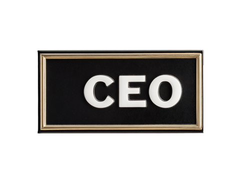Elegant CEO title plate with white lettering on a black background, framed in gold, signifying executive status and corporate leadership.