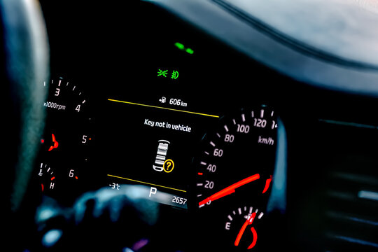 Car color screen dashboard with warning message.Key not in vehicle indicator.Intelligent driver digital information panel system in modern luxury automobile