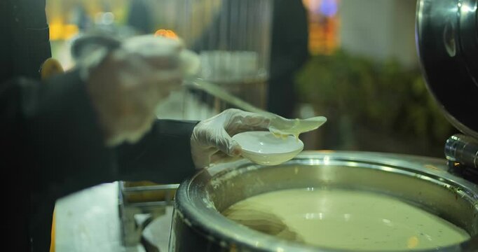 Indian caterers preparing delicious chat, panipuri, and patis at a festive event, showcasing vibrant flavors and traditional street food culture