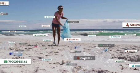 Volunteer entering beach and picking litter for cleaning beach, starting digital overlays rising - Powered by Adobe