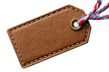 A brown leather name tag with an eyelet on a transparent background
