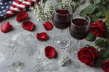 Two Glasses of Red Wine with Red Roses Rose Petals and Baby's Breath on Gray Surface American Flag Corner