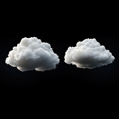 Two fluffy white clouds against black background