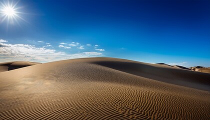 Naklejka premium metallic sand dunes shifting under a bright blue sky displaying liquid chrome texture