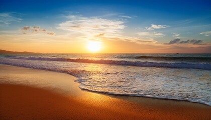 Fototapeta premium serene sunset beach golden sand ocean waves and tranquil sky