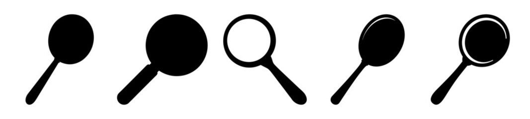 Variety of magnifying glass icons in black and white design set