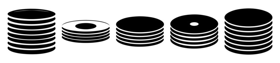 Stacks of Round Objects with Hole and Solid Centers on White Background