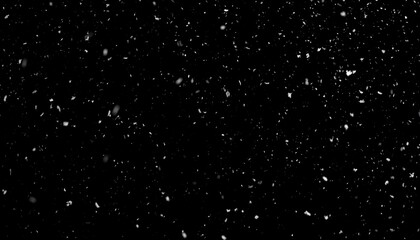 Abstract black background with scattered white particles
