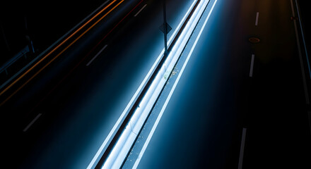 Illuminated Highway At Night With Streaking Headlights And Abstract Traffic Motion