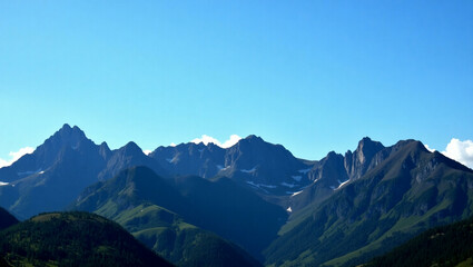 Stunning Majestic Mountain Landscape with Snow-Capped Peaks and Clear Blue Sky in Scenic Wilderness

