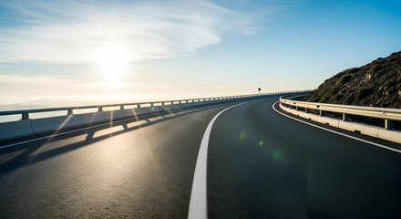 Scenic mountain road at sunrise offers a captivating journey through nature