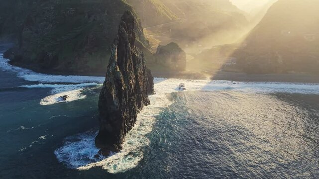 Explore Ribeira da Janela at sunset with breathtaking ocean views and dramatic rock formations. Aerial sunset view of Volcanic rock Ribeira da Janela in Atlantic ocean on Madeira Island, Portugal