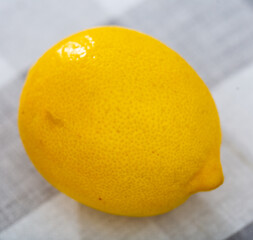 Fruits of sour juicy lemon served to table in cafe