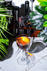 La Perla alcoholic cocktail drink with tequila, manzanilla sherry, pear liqueur, lemon peel