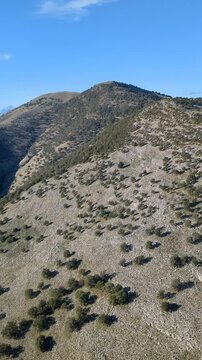 Powered paragliding paramotor flying over Albanian coast mountains and beaches aerial panorama landscape view,Albania,Balcan