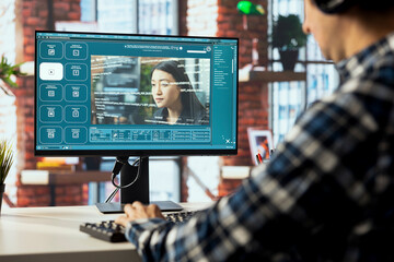 Graphic editor at workstation arranging interface elements in PC software, positioning buttons,...