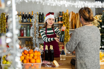 Female supermarket salesperson offers a man to buy alcohol for his New Year's celebration