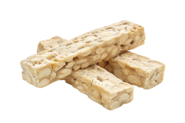 Raw tempeh blocks made from fermented soybeans on white background