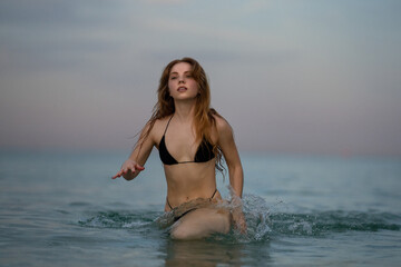 Sexy bikini body woman on paradise tropical beach. Pretty girl enjoying the beach. Sexy woman...