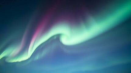 Low angle perspective showcasing a seamless gradient northern light in the sky. Different beautiful colors.