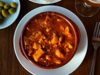 Portion of stewed tripe is cooked in plate - stomach of cattle. Traditional dish of Russian cuisine...