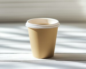 Tan Paper Coffee Cup in Sunlight on White Wooden Background