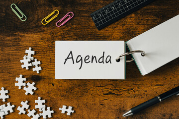 There is word card with the word Agenda. It is as an eye-catching image.